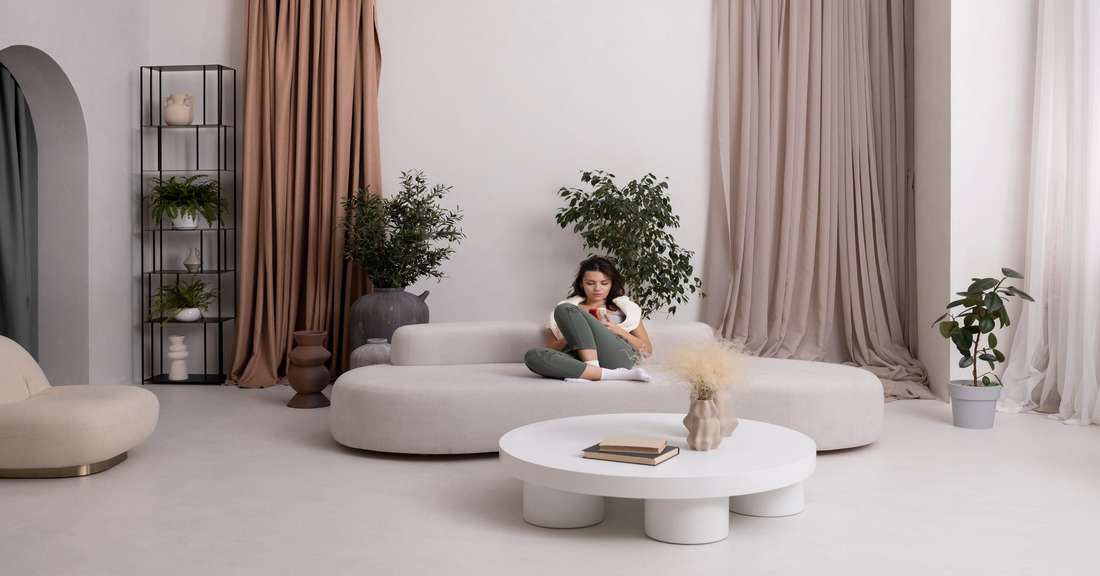 Minimalist 2026 furniture with warm tones, natural wood, and cozy textures in a modern living room setting.