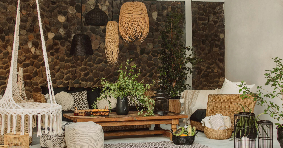Cozy modern living room featuring a rustic solid wood coffee table, farmhouse-style chairs, and natural textures that blend traditional warmth with contemporary comfort.